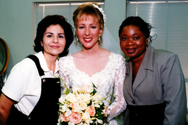 Houston makeup aritst Cinthia Moore, help and a happy bride pose for one quick photo before the big moment.